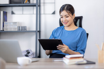 Asian Business woman work in home. concept of tax, report, accounting, statistics, and analytical research.