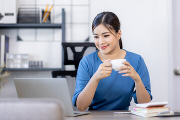 Asian Business woman work in home. concept of tax, report, accounting, statistics, and analytical research.