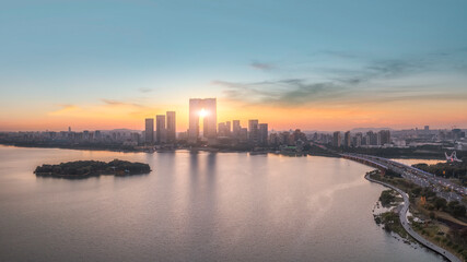 Aerial photography of the urban landscape by Jinji Lake in Suzhou under sunset