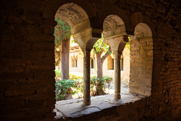 Window and interior of an old Christian monastery in Italy. Medieval architecture