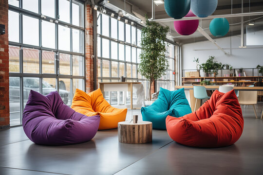  An image capturing colorful bean bag chairs in a casual startup office, creating an informal meeting area that fosters a creative and relaxed atmosphere for collaboration and brainstorming.
