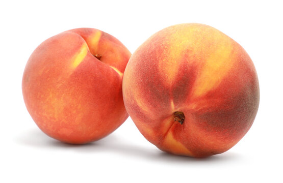 Delicious fresh ripe peaches isolated on white