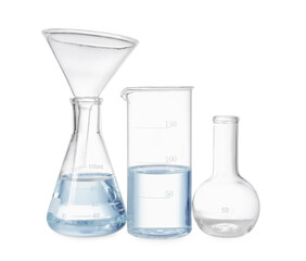 Different laboratory glassware with water isolated on white