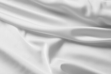 Texture of white silk ripple fabric as background, top view
