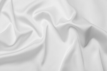 Obraz premium Texture of white silk ripple fabric as background, top view