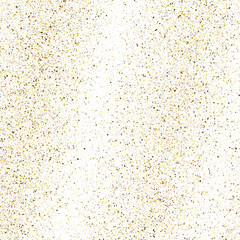 Gold glittering dust on white backdrop