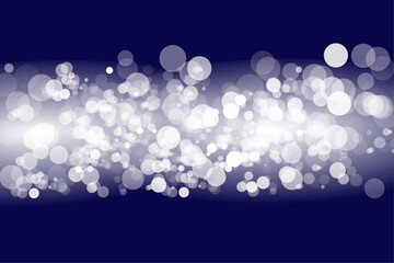 Abstract bokeh lights on blue background