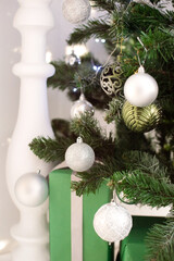 Christmas golden balls hanging on the Christmas tree