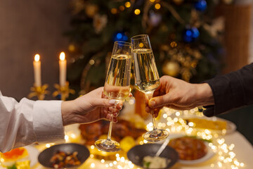 hands with glasses of champagne close-up