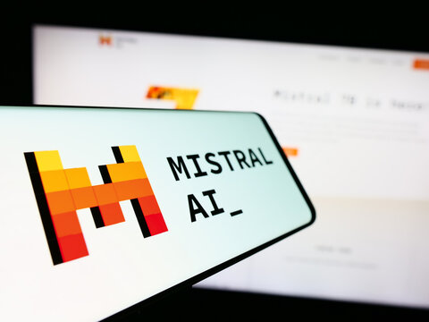 Stuttgart, Germany - 11-27-2023: Mobile phone with logo of French artificial intelligence company Mistral AI SAS in front of website. Focus on center-left of phone display.