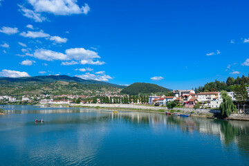 Fototapeta na wymiar Visegrad, Republic of Srpska, Bosnia and Herzegovina - August 13, 2023: View of the city of Visegrad in Bosnia and Herzegovina and the Drina River 