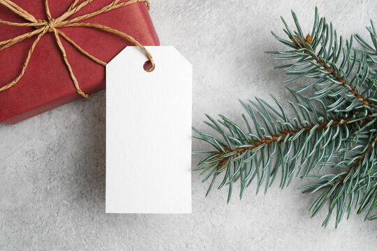 Blank white gift tag or label with copy space for text, christmas or new year holidays decor
