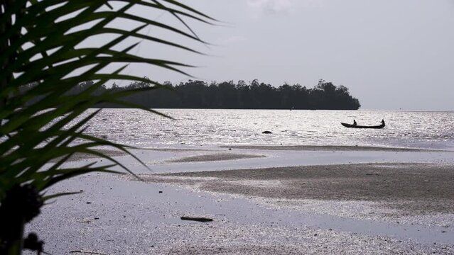 Boat with a fisherman off the coast of Cameroon