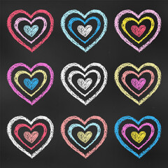Realistic Chalk Drawn Sketch. Set of Design Elements Colorful Hearts Isolated on Chalkboard Backdrop.