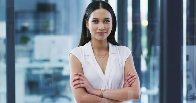 Woman, arms crossed and confident with face, office and professional, employee and leader. Portrait, young and workplace for career, financial clerk and businesswoman for startup, job and elegant