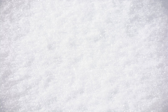 closeup texture of a white snow. cold nature outdoor background