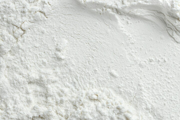 Rice loose face powder as background, top view