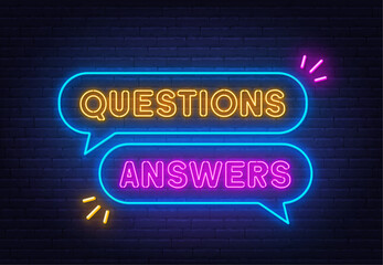 Questions Answers neon sign in the speech bubble on brick wall background.