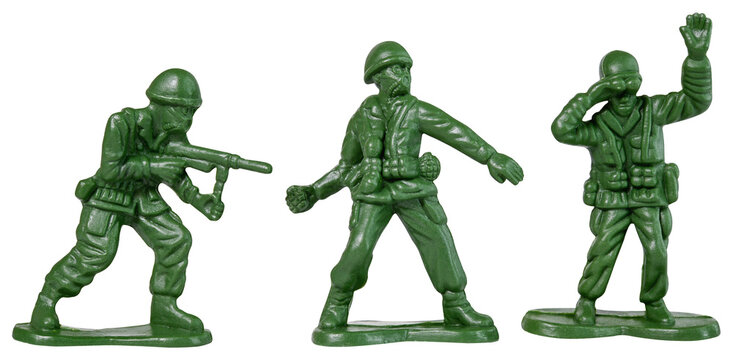 Green toy soldiers isolated on a transparent background. Traditional figurines.