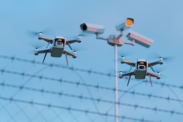 Elevated Surveillance Drones Monitoring Over Security Barbed Wire Fences