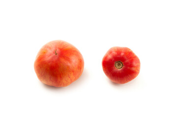 Two pink tomatoes isolated on white background with clipping path. .