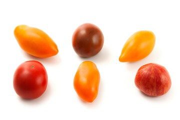 Assort of different shape and color tomatoes isolated on white background with clipping path. .