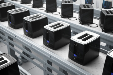 Automated Production Line of Sleek Modern Black Digital Toasters