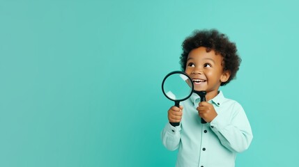 Curious Little Boy Explores the World Through a Magnifying Glass - obrazy, fototapety, plakaty