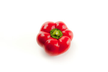 Whole red bell pepper isolated on white background with clipping path. .