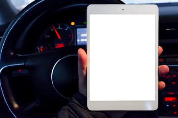 Mockup white screen.A mechanic looking at pc digital tablet in a car service garage.car engine test...