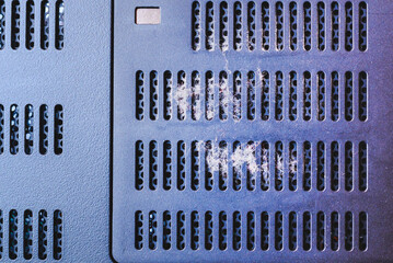 Detail of dust on a computer fan.Dust on the computer pc processor cooler with mainboard and...