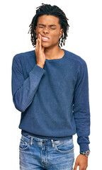 Young african american man wearing casual winter sweater touching mouth with hand with painful...