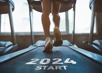 Happy new year 2024,2024 symbolizes the start of the new year. Close up of feet, sportsman runner running on treadmill in fitness club. Cardio workout. Healthy lifestyle, guy training in gym. - obrazy, fototapety, plakaty