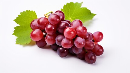 Fototapeta premium Isolated red grape with leaves on a white background .