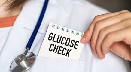 Glucose Check text on white card in hand doctor taking it out of his pocket