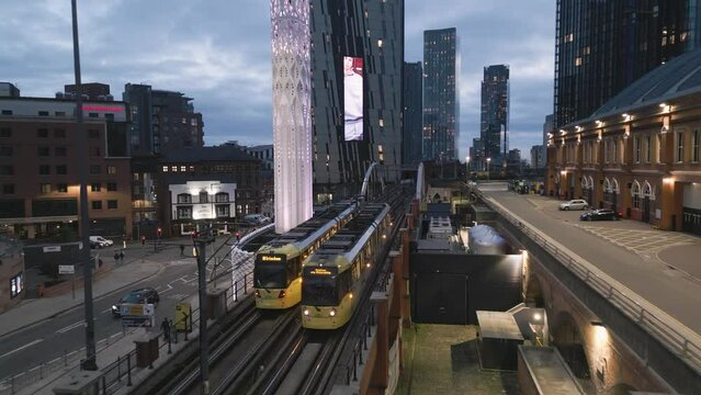 Aerial, trams and Tower of light, Deansgate, Manchester, England