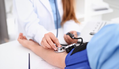 Female doctor arms make medic procedure closeup. Physical cure arterial beat exam tool nurse...