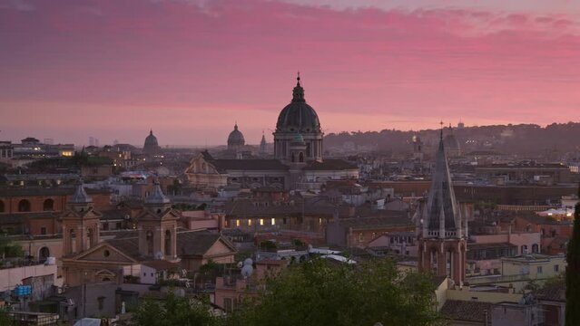 Panning shot of epic sunset in Rome, Italy. Evening sunset shot of Rome old town from Terrazza Viale del Belvedere