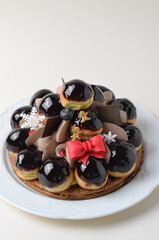 Profiterole Cake, St. Honore Cake with Christmas Decor on White Background