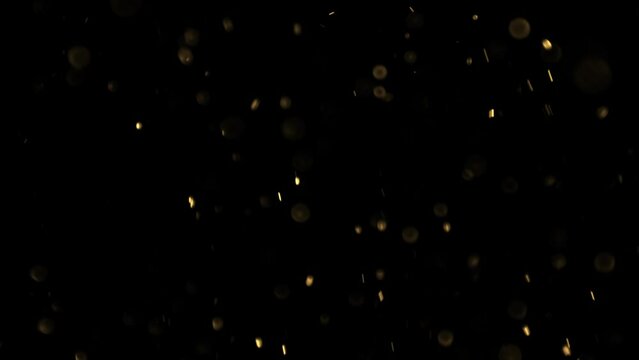 Beautiful Gold Floating Dust Particles with Flare on Black Background in Slow Motion. Looped 3d Animation of Dynamic Wind Particles In The Air With Bokeh. 4k Ultra HD