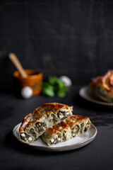 Traditional Turkish Rolled Borek Tepsi Böreği with feta cheese and spinach. Top view. Filo pastry.