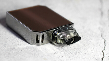 Electronic cigarette, reusable system. A fashionable trend among young people.