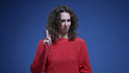 Baffled woman reacting to accusation with surprise, pointing finger to herself rejecting...