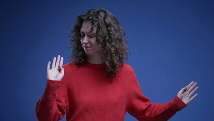 Baffled woman reacting to accusation with surprise, pointing finger to herself rejecting...