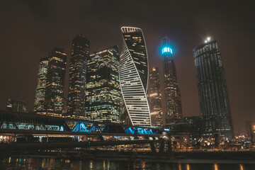 Moscow city at winter night. Modern skyscrapers in Moscow-city downtown, Federation tower, Mercury tower etc. Moscow, Russia - urban background