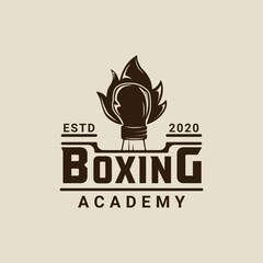 Obraz premium boxing logo vector vintage illustration template icon graphic design. fighting sport sign or symbol for academy or club or for competition or shirt print with retro typography concept