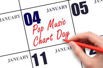 January 4. Hand writing text Pop Music Chart Day on calendar date. Save the date.