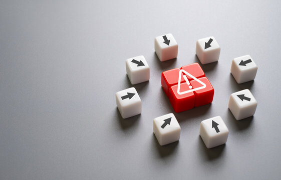 arrow cover warning sign on red cube with copy space. Risk management concept with preventive plan for any accident or unplan incident to protect business or system from failure or crisis.