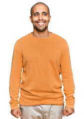 Hispanic adult man wearing casual winter sweater with a happy and cool smile on face. lucky person.