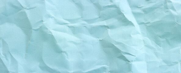 Background of crumpled blue paper